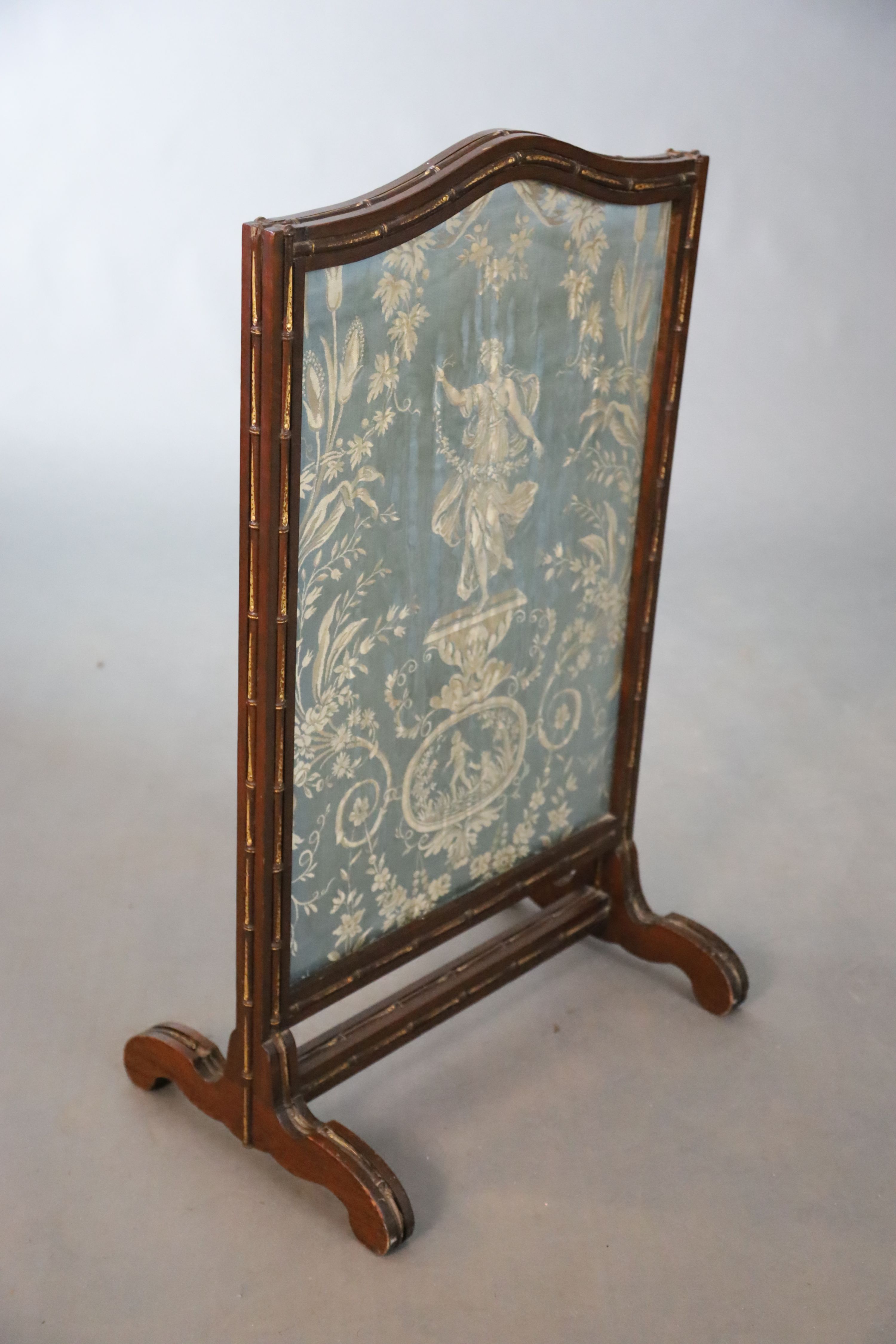 An Edwardian parcel gilt simulated bamboo fire screen, W.54.5cm H.88.5cm